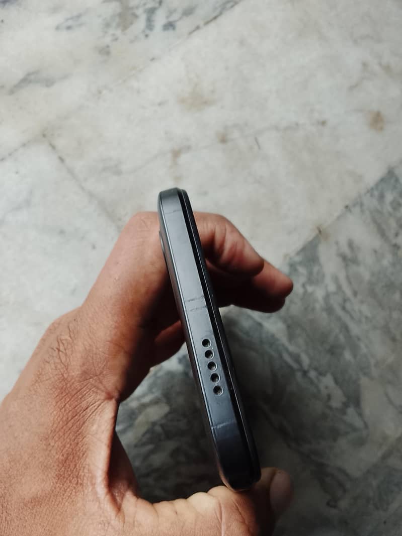 Redmi A2+ 1