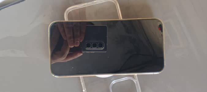 I phone 13 pro max Jv 256 gb golden No scratches Contact 03143007000
