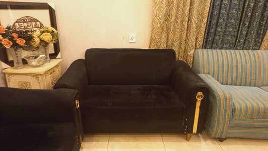 Slightly used solid black colour sofa set for sale