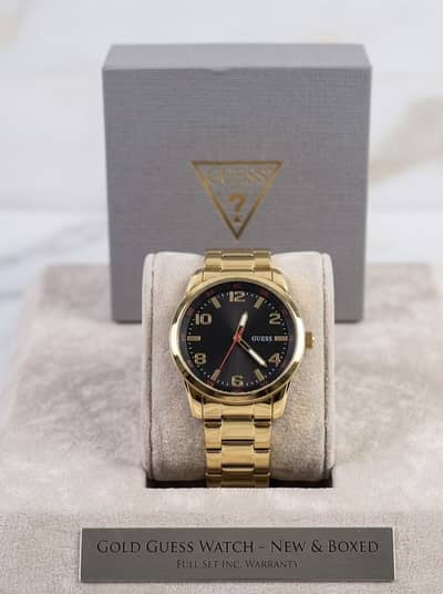 Guess men's Gold tone luxury watch