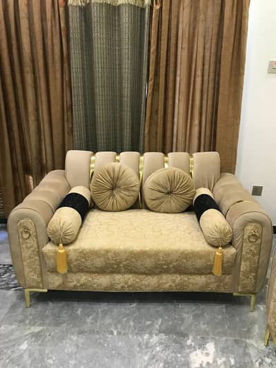Beautiful 7 seater sofa set with covers .