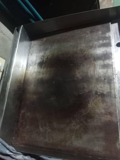 friar and hot plate