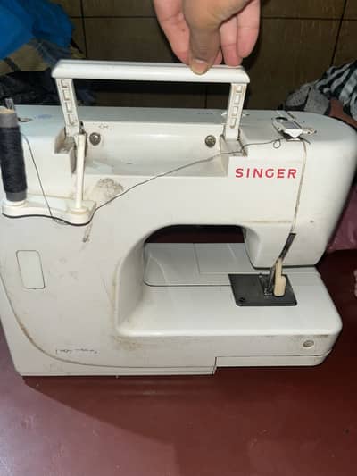 Singer machine