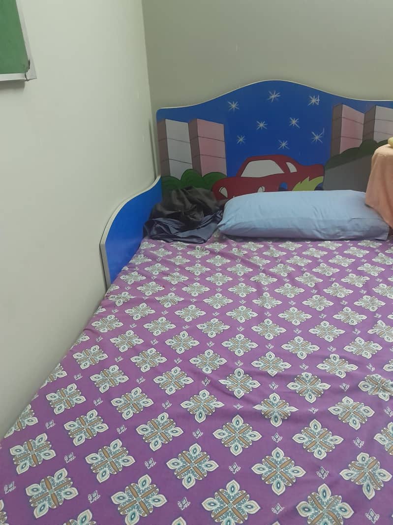 single bed, cupboard, reck table 3