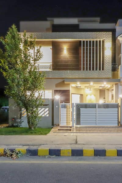 On Wide 50-Feet Road 5-Marla Brand New Luxury Ultra-Modern Design Most Beautiful Bungalow For Sale At Prime Location Of DHA Lahore Near To Park Masjid & Commercial Market.