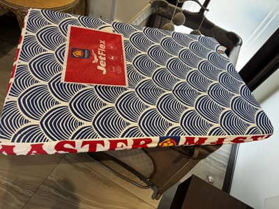 Tinnies baby cot for sale with mattress