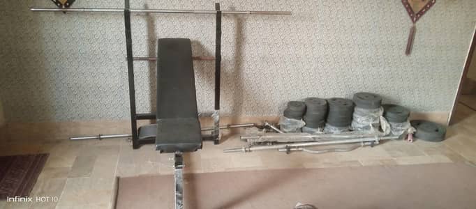 dumbbells rubber coated plats and bench