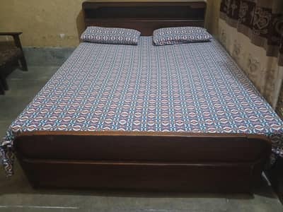 Double Bed for sale solid wood dark brown color size 60×78 (only BED)