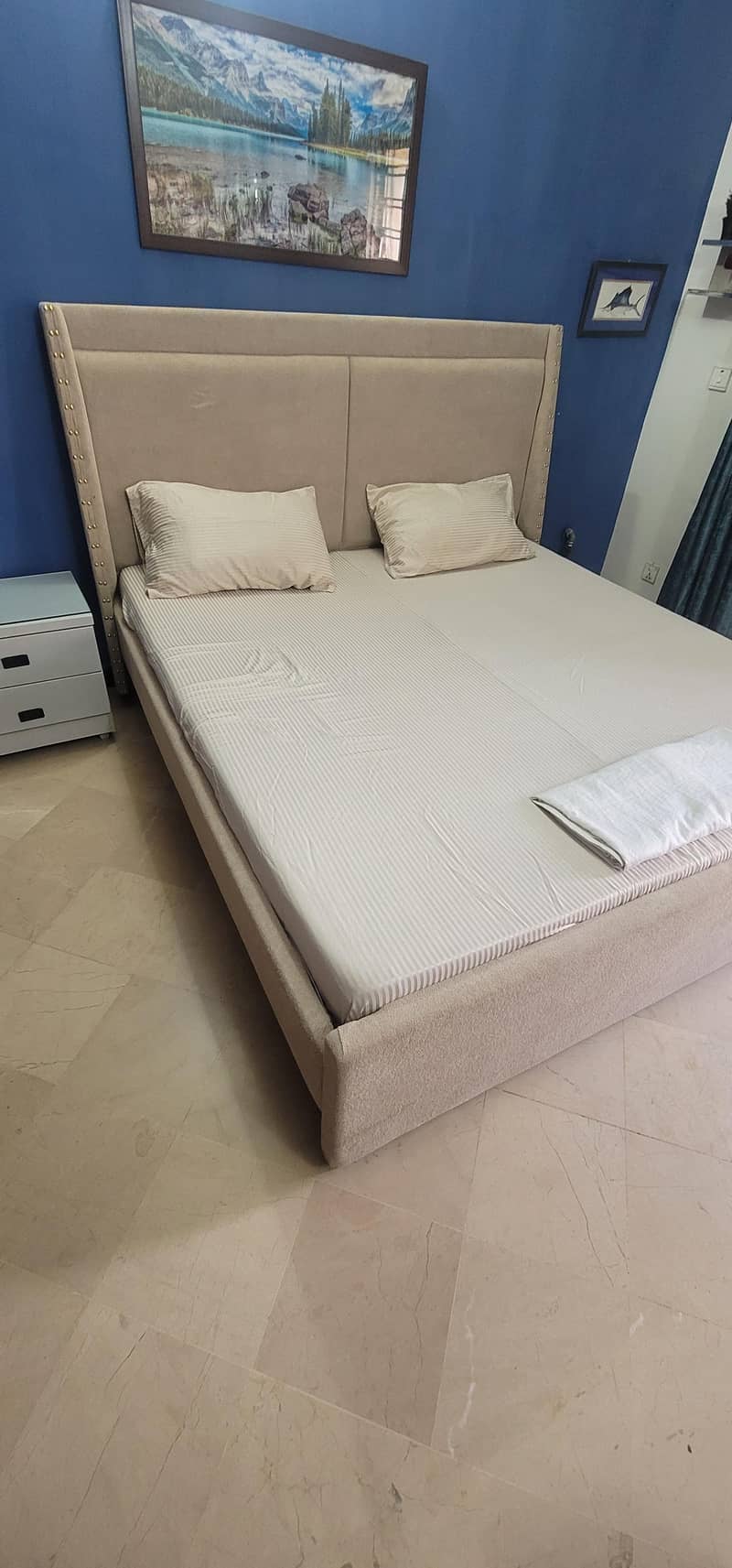 bed and sidetables . 0