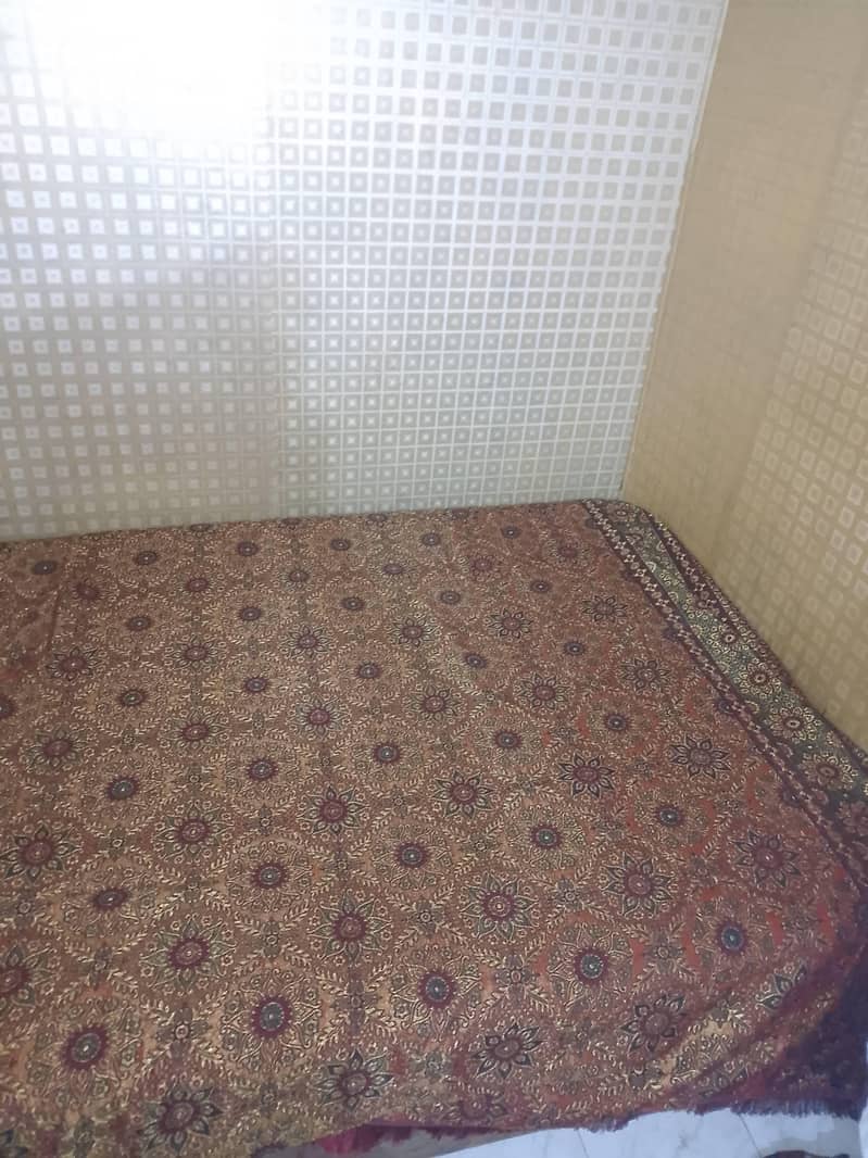 A bed , A Matress  , 2 Sofay , 1 Table . 0