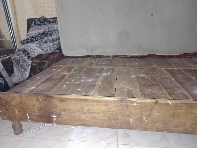 A bed , A Matress  , 2 Sofay , 1 Table . 4