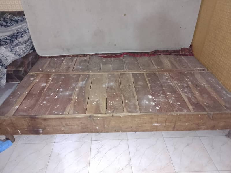 A bed , A Matress  , 2 Sofay , 1 Table . 5