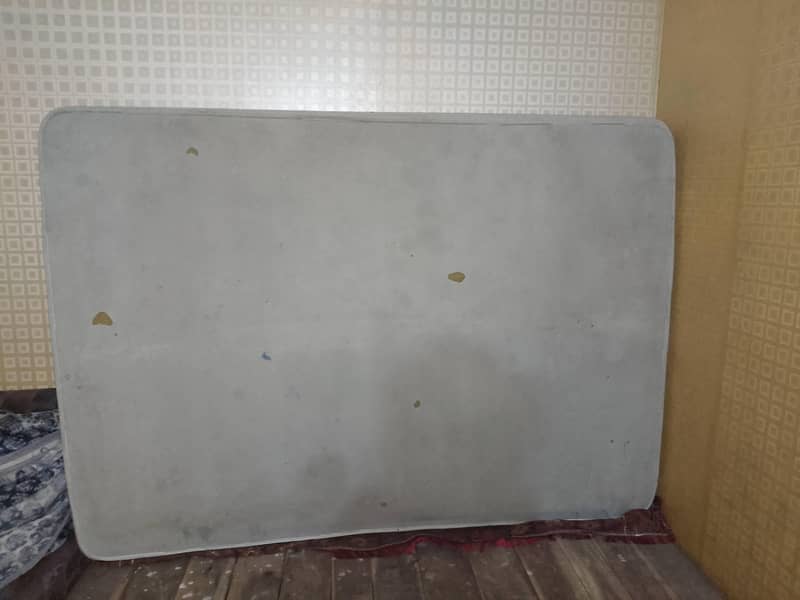 A bed , A Matress  , 2 Sofay , 1 Table . 6