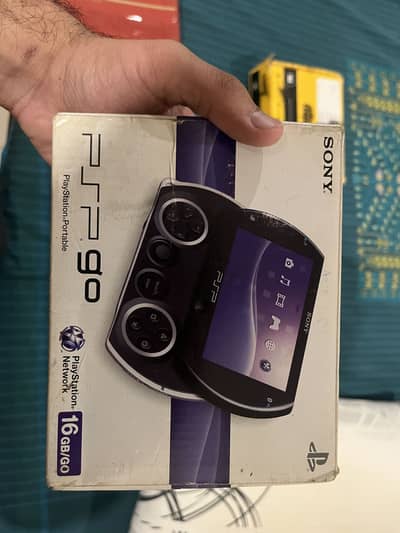 PSP go with box and manuals