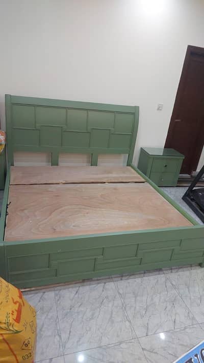 wooden bed in new condition