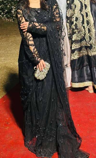 black fancy net saree