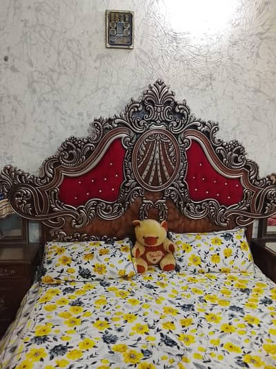 king size bed said table and dressing table