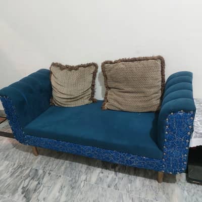 couch with 2 stools
