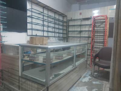 Iron shelf with glass and showcase aluminium with glass