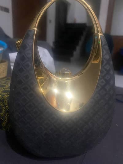 black and golden handbag