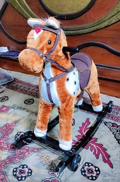 Horse swing musical toy