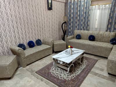 L shape sofa with two puffies and one couch 