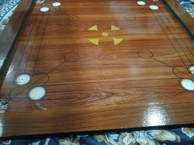 Big Carrom board game with all it's  goti
