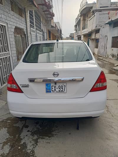 Nissan Tiida Latio, 1500cc Automatic Genuine, white colour