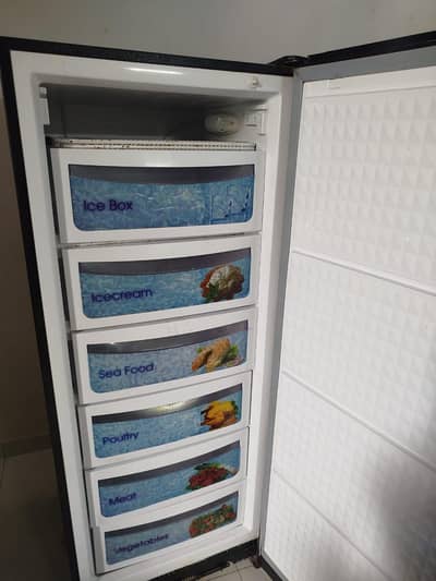 Dawlance vertical freezer glass door like new