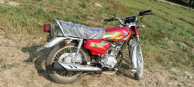 Honda 125 red colour