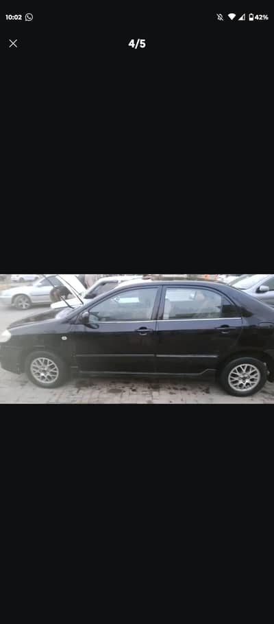 femly used car crolla 2004 saloon