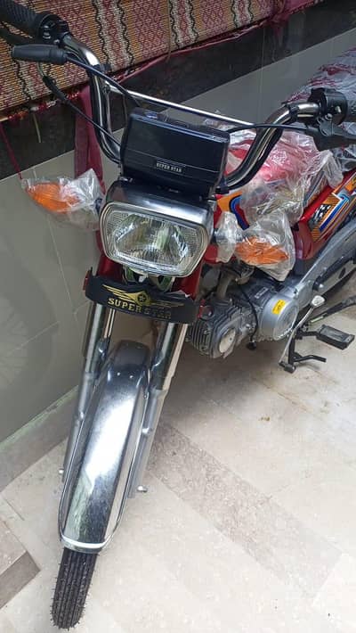 superstar 0 meter 70 cc red colour bike