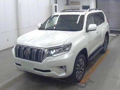 pearl white with Beige colour Toyota Prado TXL
