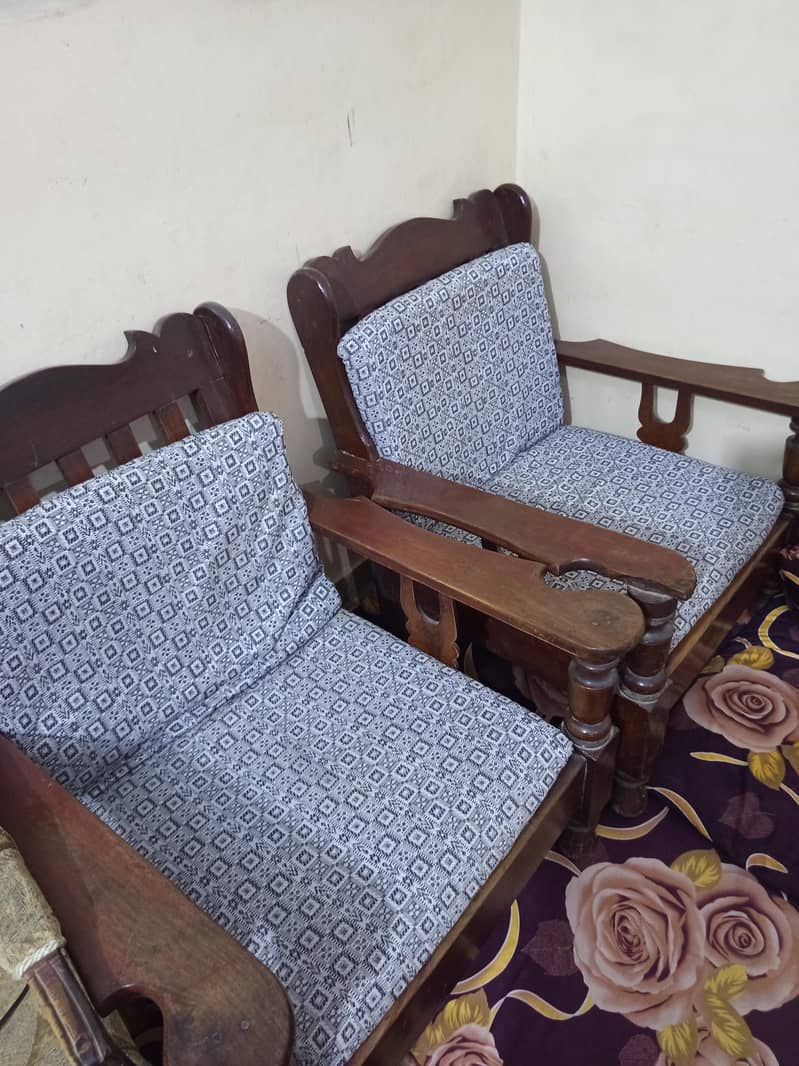 2 Wood sofas and a table 1
