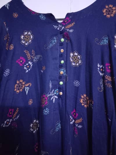 three peice suit in linen with button detailing stitched  size large