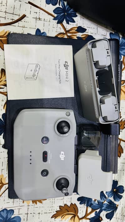 Dji mini 2 remote and batry or charger sale  dron goom ho gaya