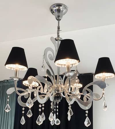 chandelier and 2 wall lights
