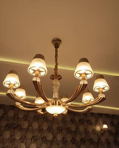 chandelier and 2 wall lights