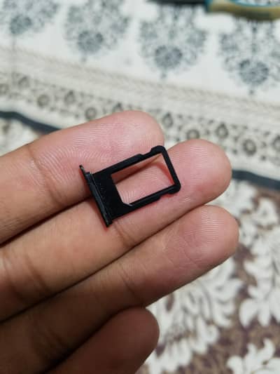 iPhone 7 Sim Tray.