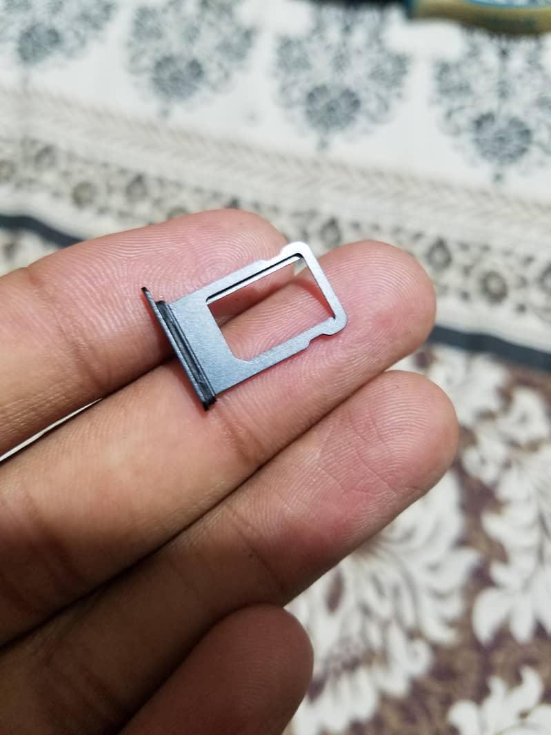 iPhone 7 Sim Tray. 1