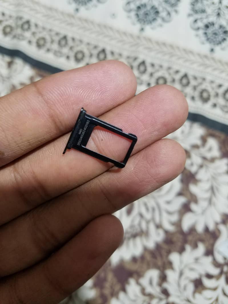 iPhone 7 Sim Tray. 2