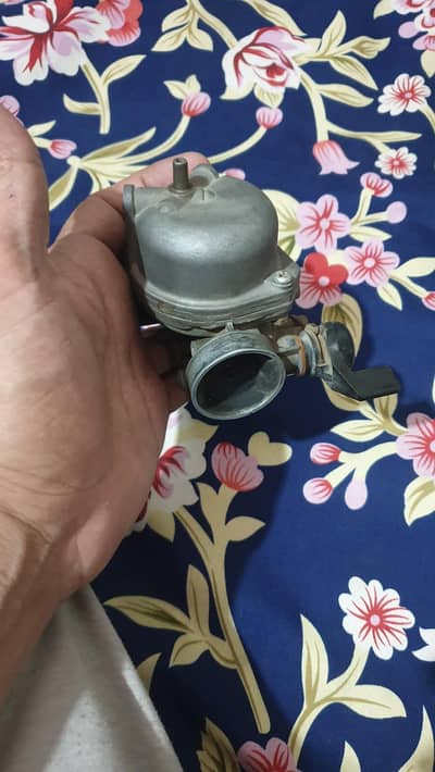 CD 70 carburetor in used