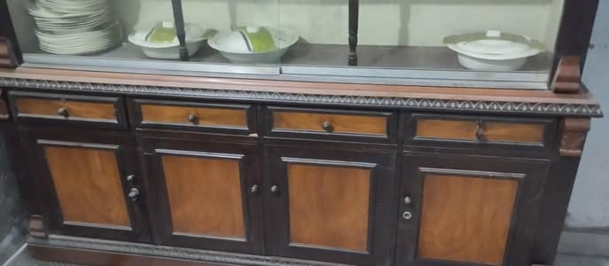 Bed, Two side tables, Dressing Table and Showcase.