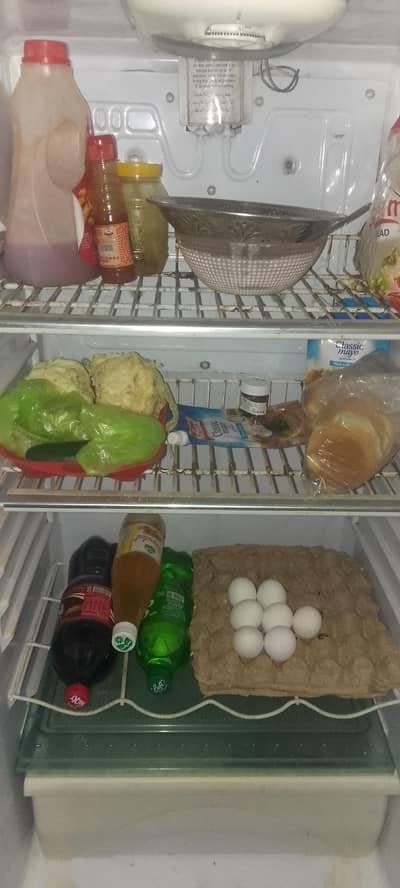 waves full size refrigerator for sale urgent. . .