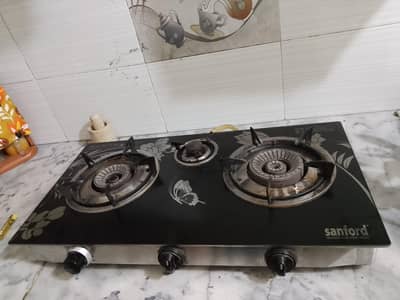 sanford glass top stove all ok gass or lpg