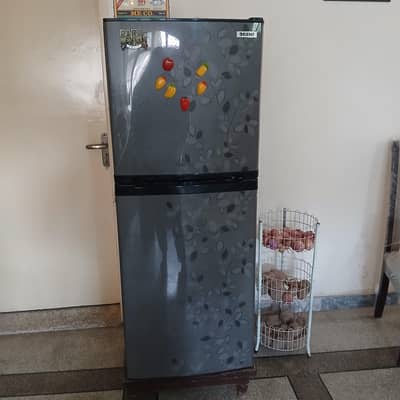 good condition refrigerator medium size