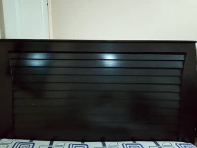 Medium size bed with chocolate brown colour and new mattress.