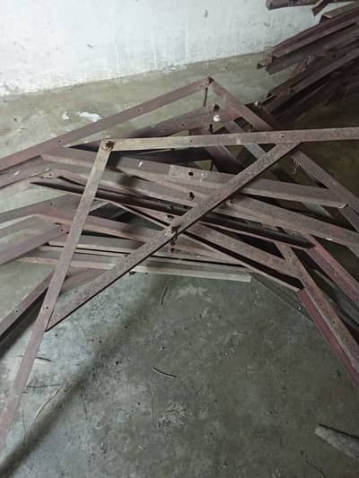 Angle iron, cement pillars, metalic wire, other iron material