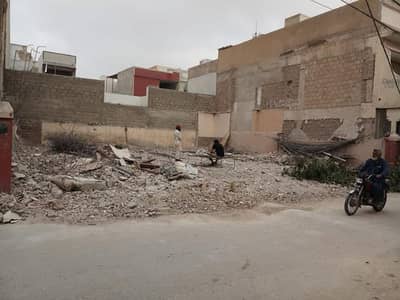 100 SQYD RESIDENTIAL PLOT AVAILABLE FOR SALE IN MODEL COLONY SHEET 22 OPPOSITE SAEED SUPER STORE