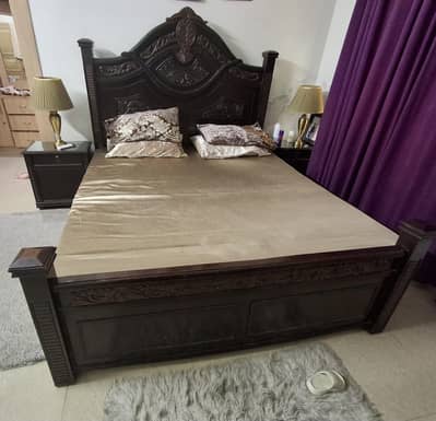 king size bed with two side tables and dresses (without mattress]